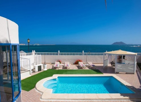 Villa Bermudez, Corralejo - Seafront Retreat with Heated Pool