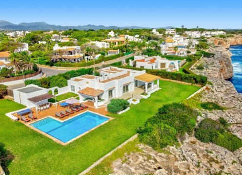 Villa Sabra in Cala d'Or: Stunning Seafront Oasis with Large Pool